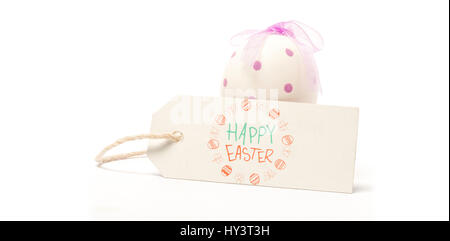 Salutation de pâques contre tag vide en face de l'oeuf de Pâques Banque D'Images