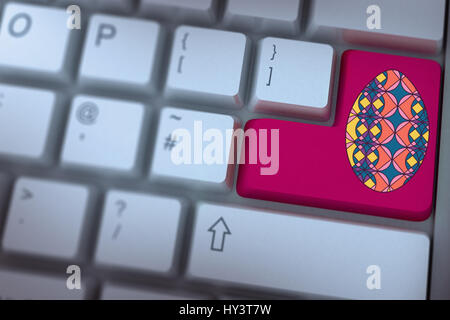PE047   01 Pâques bs nf contre la touche Entrée du clavier rose Banque D'Images