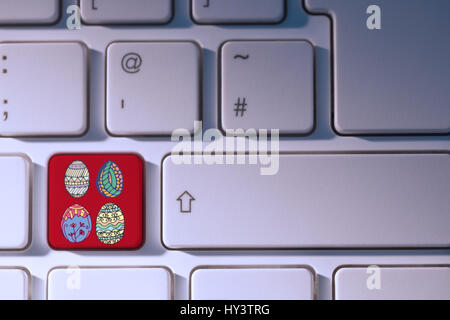 PE047   01 Pâques bs nf contre la clé rouge sur le clavier Banque D'Images