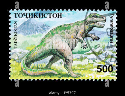 Le Tadjikistan de timbre-poste représentant un dinosaure Tyrannosaurus Banque D'Images