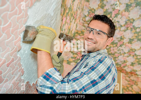 La ciselure ancienne sur un mur de motif Banque D'Images