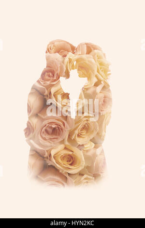 Double exposition portrait of a wedding couple combiné avec le mariage bouquet de roses Banque D'Images