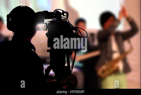 Un concert live tournage caméraman Banque D'Images