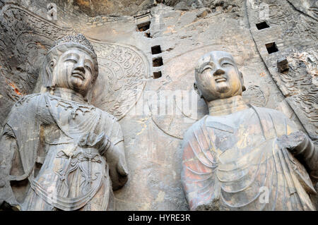 Statues de Bouddha en pierre Fengxiansi caverne à grottes de Longmen à Luoyang dans la province du Henan en Chine. Banque D'Images