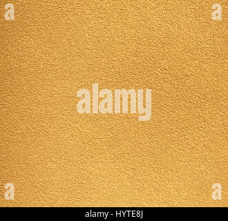 Mur de plâtre robuste jaune, la texture ou l'arrière-plan. Banque D'Images