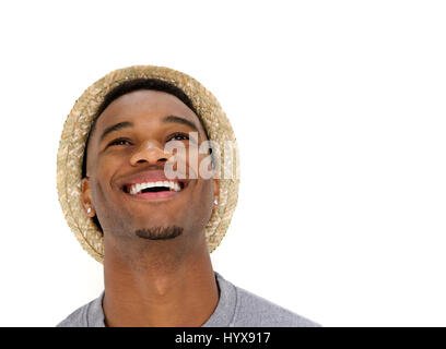 Close up portrait of a handsome young man laughing with hat Banque D'Images