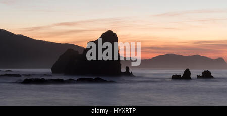 La plage au coucher du soleil Banque D'Images