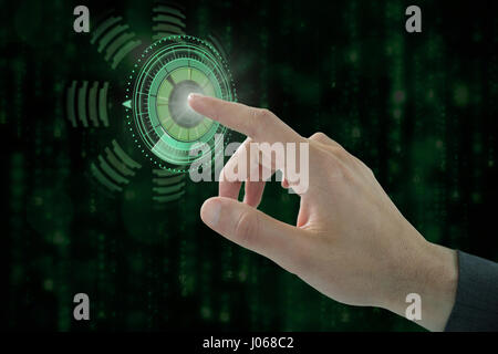 La main coupée de businessman touching digital contre écran noir et bleu généré numériquement matrix Banque D'Images