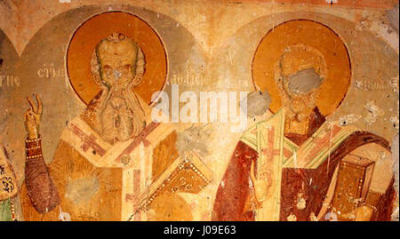 Cette fresque, intitulée 'Freska od Sv. Spas vo Cebren,' dépeint la figure du Christ dans un contexte religieux. Il met en valeur l'art spirituel de la tradition byzantine, en se concentrant sur l'imagerie divine et la représentation sacrée dans un cadre religieux. Banque D'Images