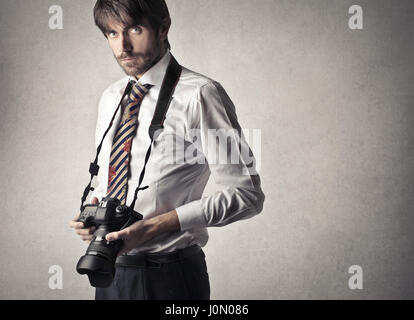 Photographe man with camera Banque D'Images