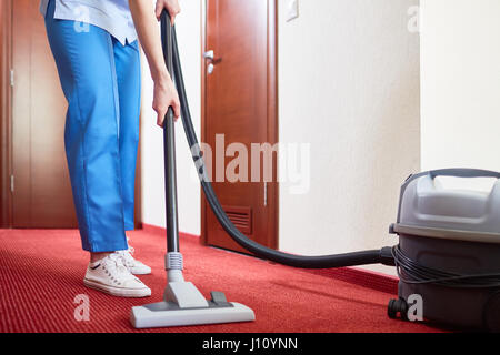 Tapis de nettoyage de ménage avec aspirateur Banque D'Images