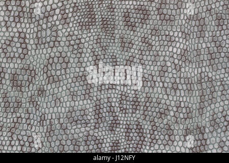 Véritable Cuir texture background close-up, gaufré sous la peau une belle imitation de leopard, impression couleur bleu, mode tendance jungle background Banque D'Images