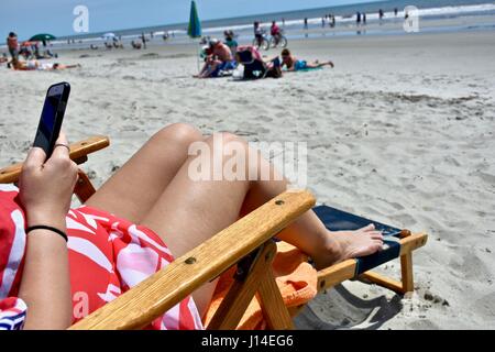 S'imprégner de soleil sur l'île de Hilton Head, South Carolina Beach Banque D'Images