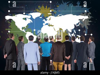 Digital composite des gens d'affaires dans le groupe à la carte colorée à la peinture avec des éclaboussures sur wall background Banque D'Images