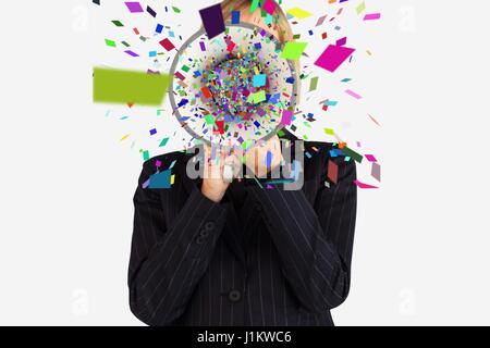 Digital composite of Businesswoman using megaphone emitting confetti against white background Banque D'Images