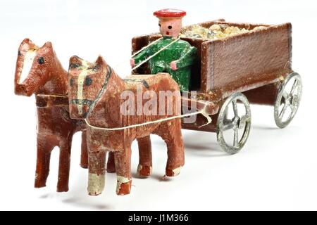 Entraîneur de chevaux les monts Métallifères/ Allemagne isolé sur fond blanc Banque D'Images