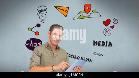 Digital composite de certain jeune homme à l'aide de Tablet PC avec le texte et les icônes en arrière-plan Banque D'Images