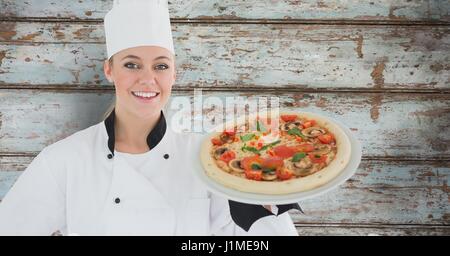 Digital composite of Composite image of female chef de pizza Banque D'Images