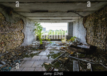 Hôtel Polissya dans la ville fantôme de Pripyat de centrale nucléaire de Tchernobyl d'aliénation de la zone autour de la catastrophe du réacteur nucléaire en Ukraine Banque D'Images