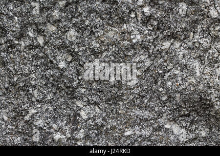 Mega-crysts sont intégrés dans des cristaux de big rock. Le rose et blanc dans le granit sont le feldspath minéral appelé Banque D'Images