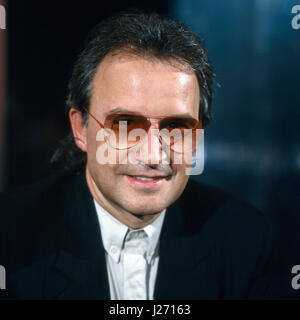 Italienischer und Musikproduzent Komponist Giorgio Moroder, Deutschland 1980 er Jahre. Le producteur de musique et compositeur italien Giorgio Moroder, l'Allemagne des années 1980. Banque D'Images