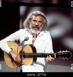 Französischer Sänger, Liedermacher Lyriker und Georges Moustaki, Deutschland 1980 er Jahre. Le chanteur français, auteur-compositeur et parolier Georges Moustaki, l'Allemagne des années 1980. Banque D'Images