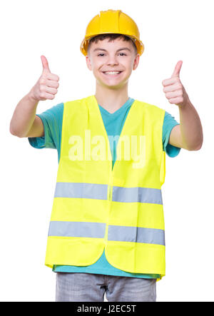 Boy wearing hard hat jaune Banque D'Images