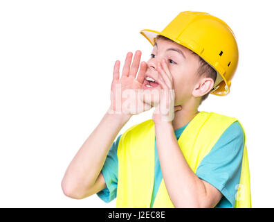 Boy wearing hard hat jaune Banque D'Images