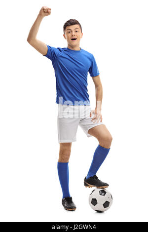 Portrait d'un jeune joueur de football gesturing bonheur isolé sur fond blanc Banque D'Images