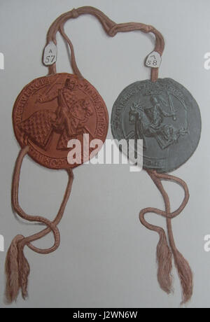 Ce titre fait référence à une lettre d'un baron, probablement datée de 1301, et associée à une corde ou à un document de cette période. Il peut s'agir d'un document historique lié à la noblesse médiévale, à la politique ou aux affaires foncières. Banque D'Images