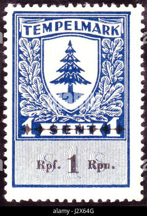L'étiquette adhésive estonienne, datée de 1941, comporte une dénomination de 1 pfennig. Cet objet est un artefact historique de la seconde Guerre mondiale, reflétant l'occupation du pays et l'histoire postale au cours de la période. Banque D'Images