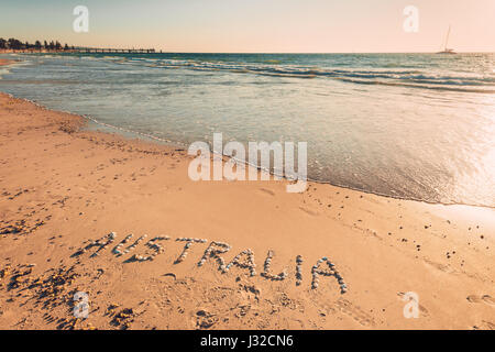 Texte tiré de l'Australie à l'aide de coquillages sur le sable à la plage Banque D'Images