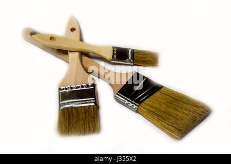 3 brosses de peinture sur surface blanche Banque D'Images