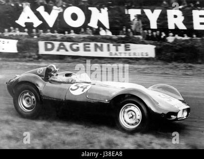 Lister Jaguar, Archie Scott Brown. Empire 1957 course pour le trophée Banque D'Images