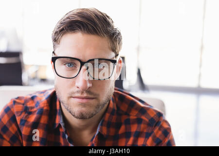 Close up portrait of businessman wearing eyeglasses Banque D'Images