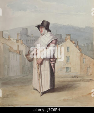 Ce portrait (DV271) représente une femme vêtue d'une tenue galloise traditionnelle. Les vêtements, riches en signification culturelle, mettent en valeur le style vestimentaire gallois traditionnel, mettant en valeur le patrimoine régional et l'identité culturelle. Banque D'Images