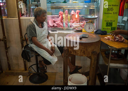 Singapour, République de Singapour, en Asie, un boucher au marché Tekka Banque D'Images