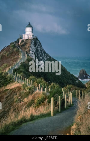 Phare sur le Nugget Point - des images d'une partie de côte de l'île du sud de Nouvelle-Zélande Banque D'Images