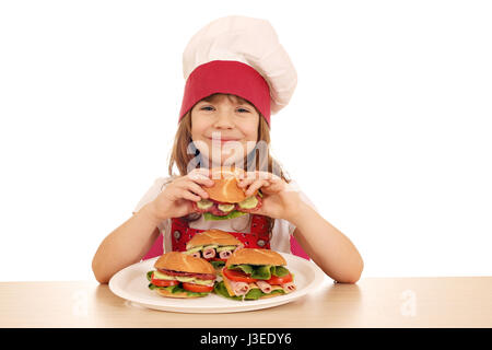 Happy little girl cook manger sandwich Banque D'Images