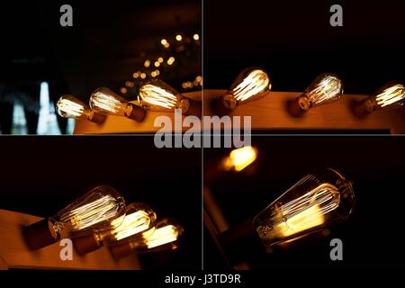 L'ampoule d'Edison accroché à un long fil. Lumière jaune chaud confortable Banque D'Images