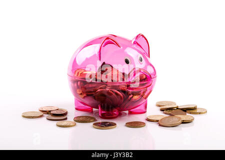 Pink piggy bank isolé sur fond blanc Banque D'Images