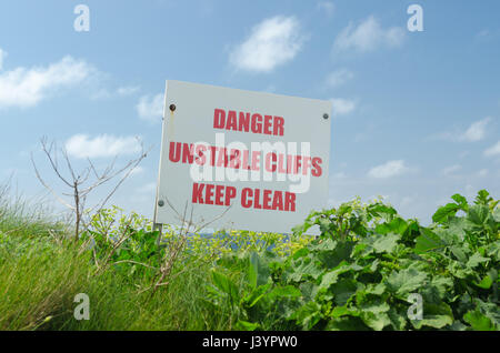 Avertissement Signe de danger dû à l'instabilité des falaises de la côte sud-ouest près de chemin Thurlestone dans le South Hams, Devon Banque D'Images