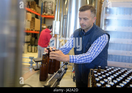 Coopérative de l'usine de bouteilles d'emballage fin de ligne de production Banque D'Images