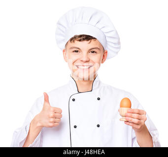 Teen boy wearing uniformes chef Banque D'Images