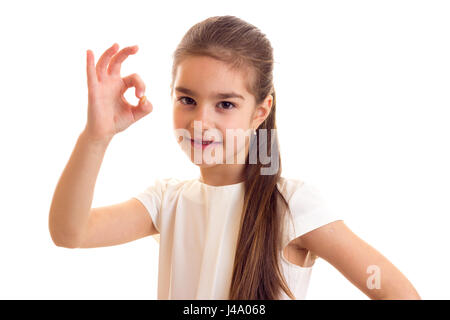 Petite fille en T-shirt blanc et une jupe noire Banque D'Images