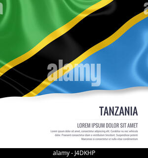 Drapeau soyeux de Tanzanie forme sur un fond blanc avec le texte en blanc pour votre message publicitaire. Le rendu 3D. Banque D'Images