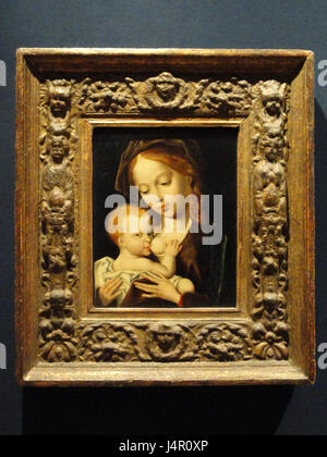 Cette peinture de l'atelier Joos van Cleve, datant d'environ 1530-1535, représente la Vierge à l'enfant. C'est un bel exemple de l'art de la Renaissance flamande, mettant en valeur le style détaillé et les thèmes religieux communs dans l'art nord-européen de l'époque. Banque D'Images