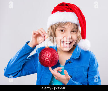 Little girl in santa hat Banque D'Images