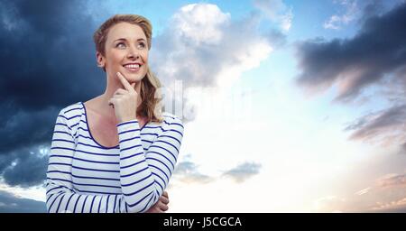 Digital composite of Thoughtful woman against sky Banque D'Images