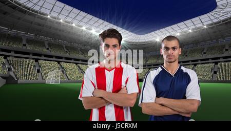 Digital composite de joueurs de football in stadium Banque D'Images